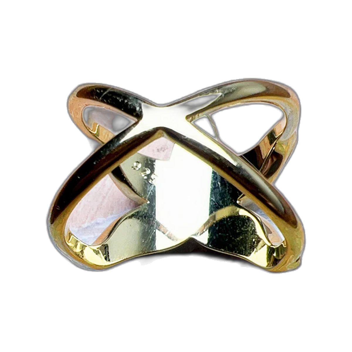 Gold-tone starfish ring openwork crisscross band shown on pastel painted backdrop