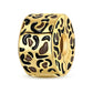 gold-tone barrel bead with leopard-pattern enamel detailing