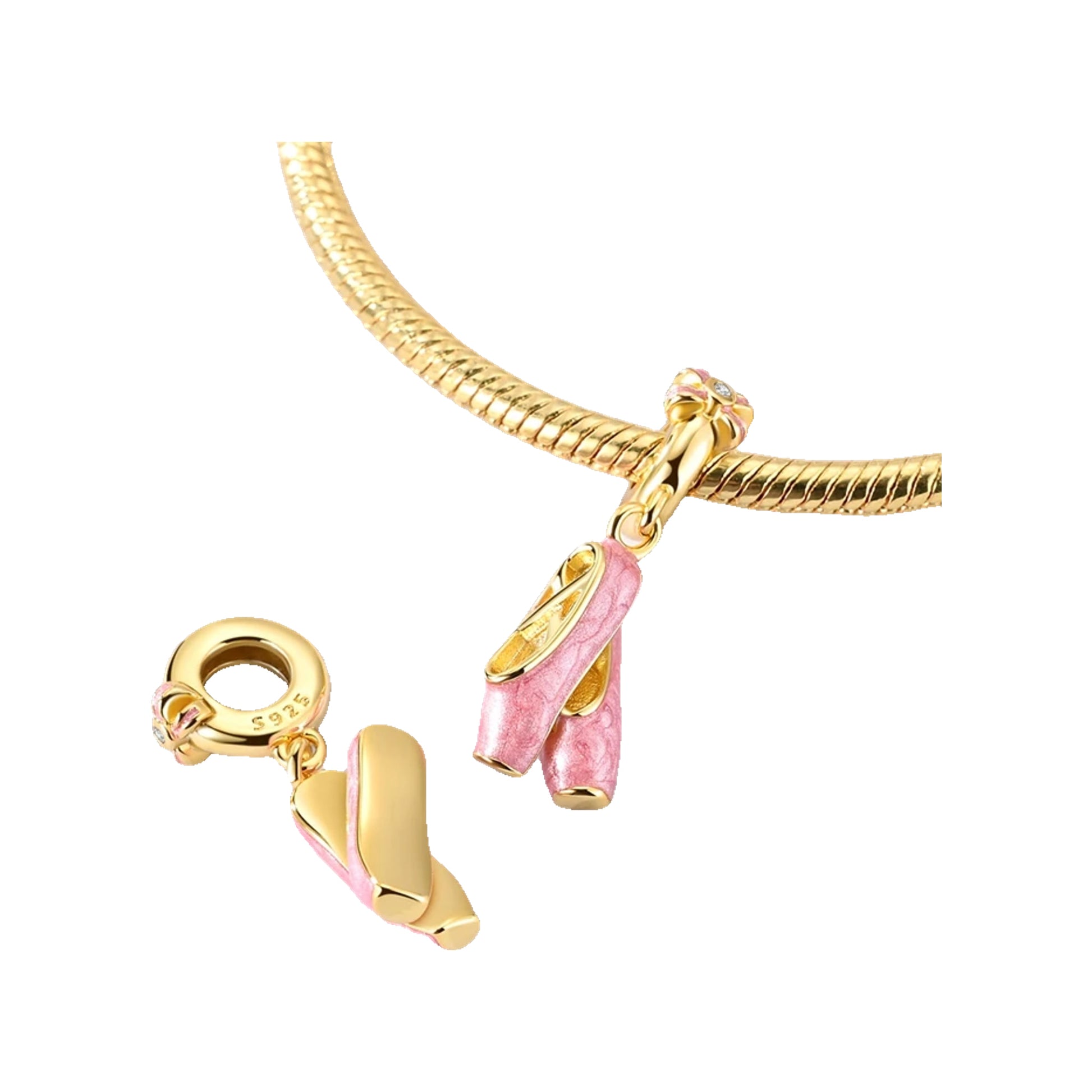 Gold-tone ballet slipper dangle charms with pink enamel finish shown on a bracelet