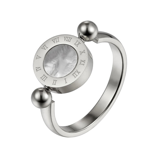 Silver-tone Roman numeral spinner ring with mother-of-pearl center shown angled