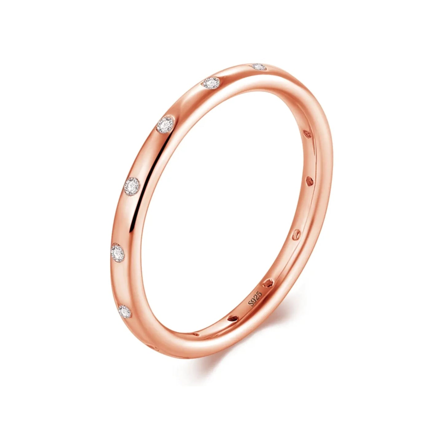 Slim scattered-stone band ring in rose gold-tone on white background