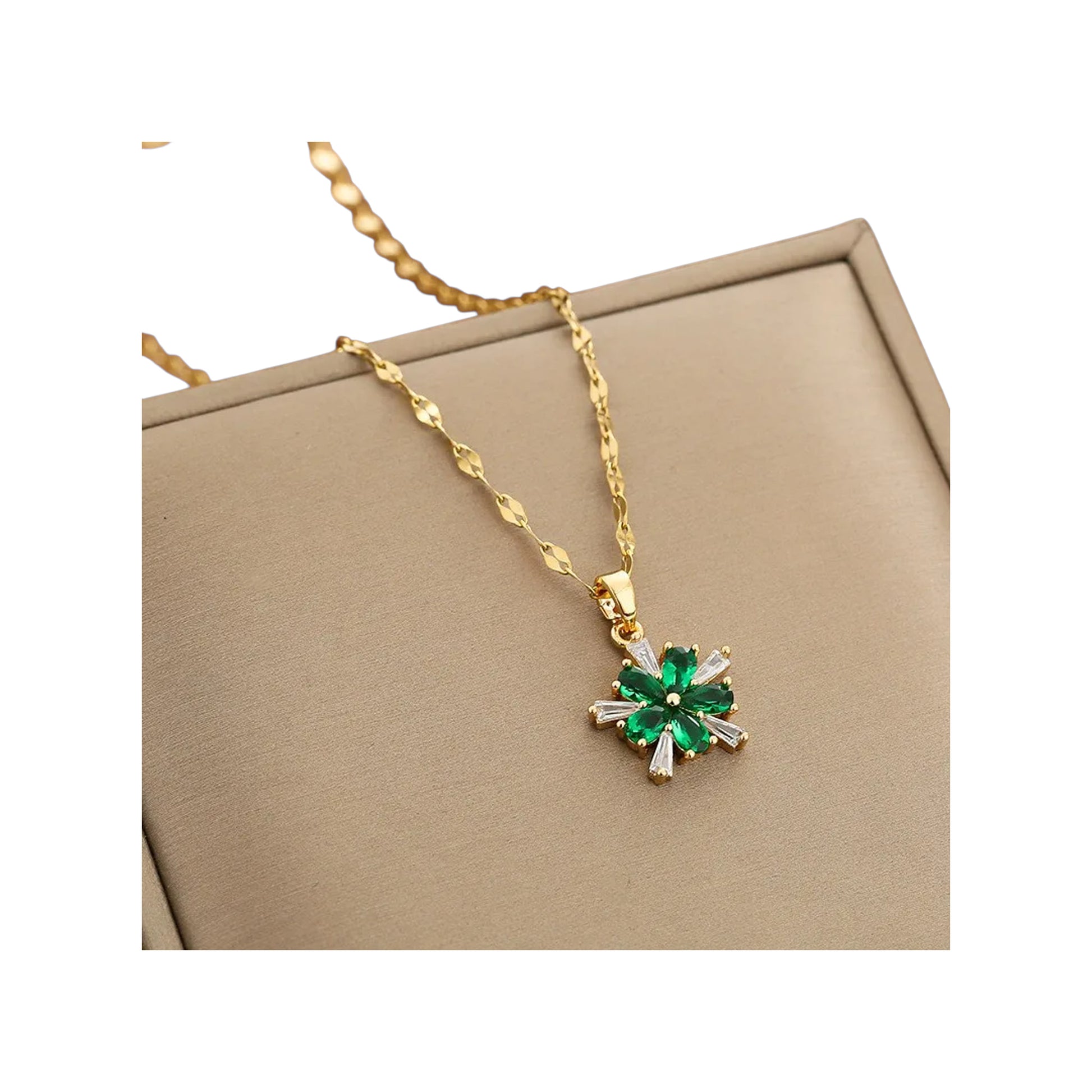 gold-tone pendant necklace with green floral cluster and baguette clear accents