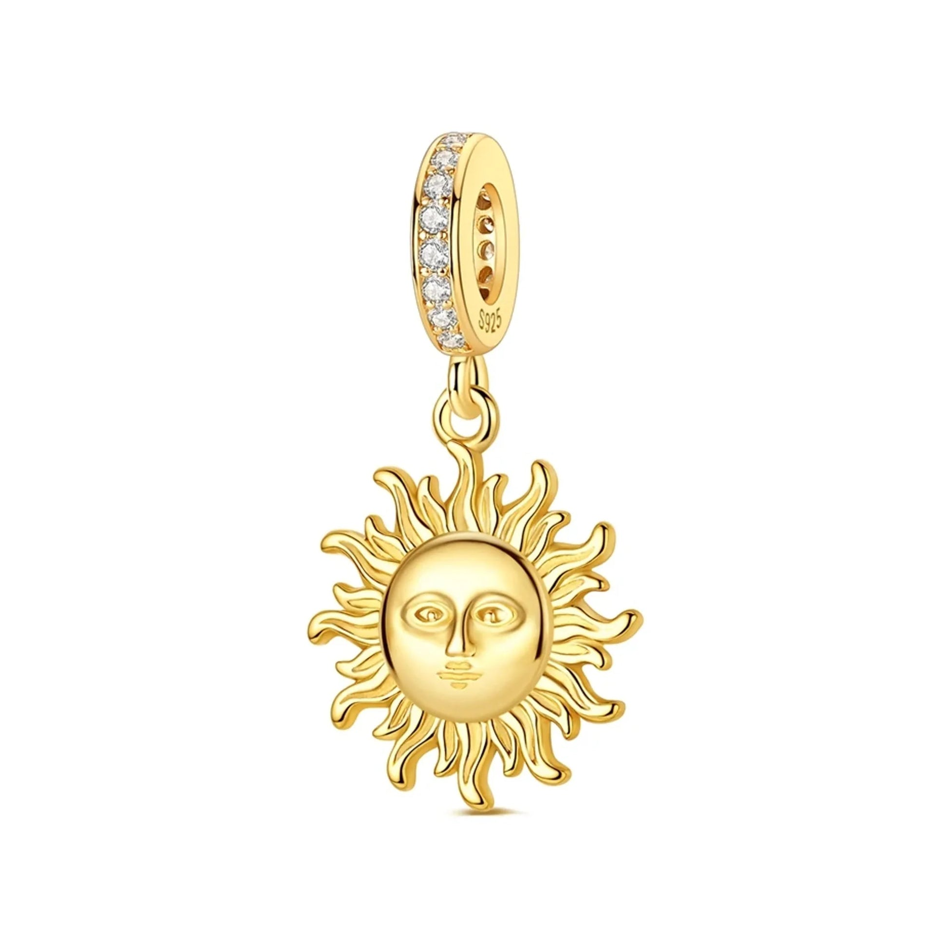 Gold-tone sun face dangle charm with textured rays and crystal-accented bail