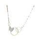 Silver-tone double-ring pendant with pavé butterfly displayed in a jewelry box