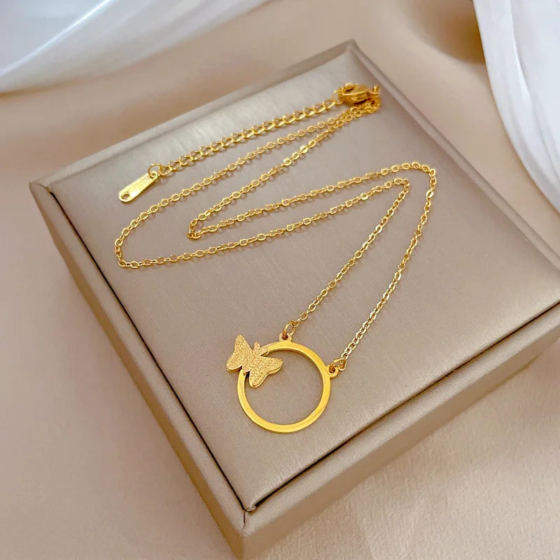 Gold-tone circle pendant necklace with adjustable extension chain product shot