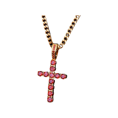 Gold-tone curb chain with small cross pendant set with pink round stones and a stone-paved bail