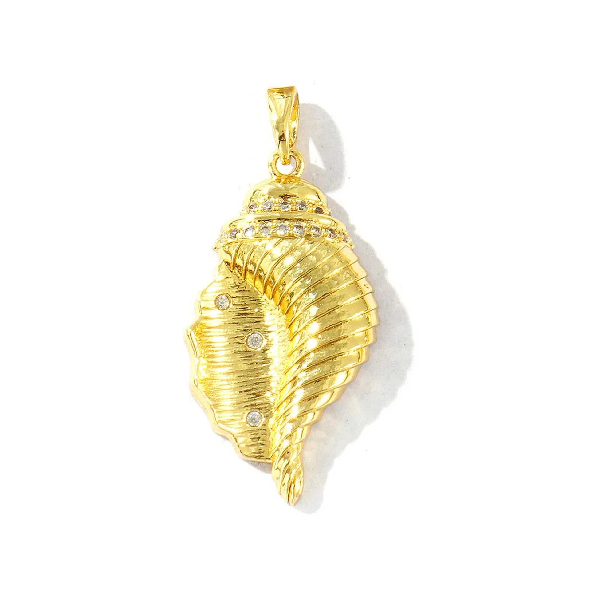 Long gold-tone conch pendant shown face-forward with detailed layered ribs
