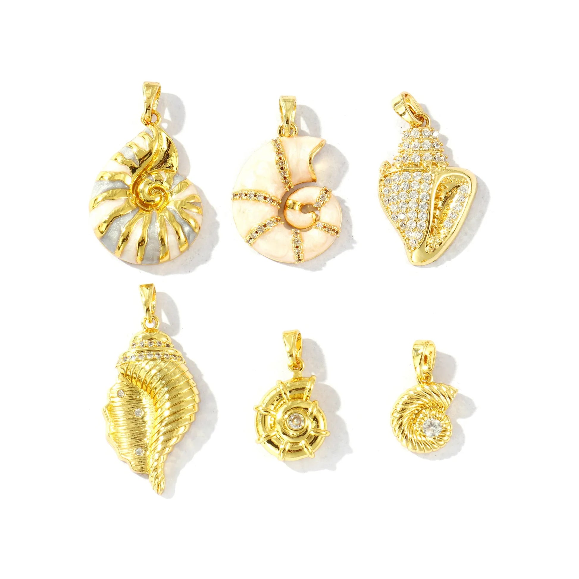 Six gold-tone seashell charm pendants with rhinestones and enamel in assorted shapes and sizes