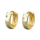 Star-Set huggie hoops in gold-tone front view with star-set crystals