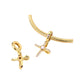 Close-up of gold-tone cross dangle charm with pink heart and pink pavé stones on a snake chain bracelet.