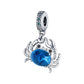 Crab dangle charm with iridescent blue center stone and pave crystal bail