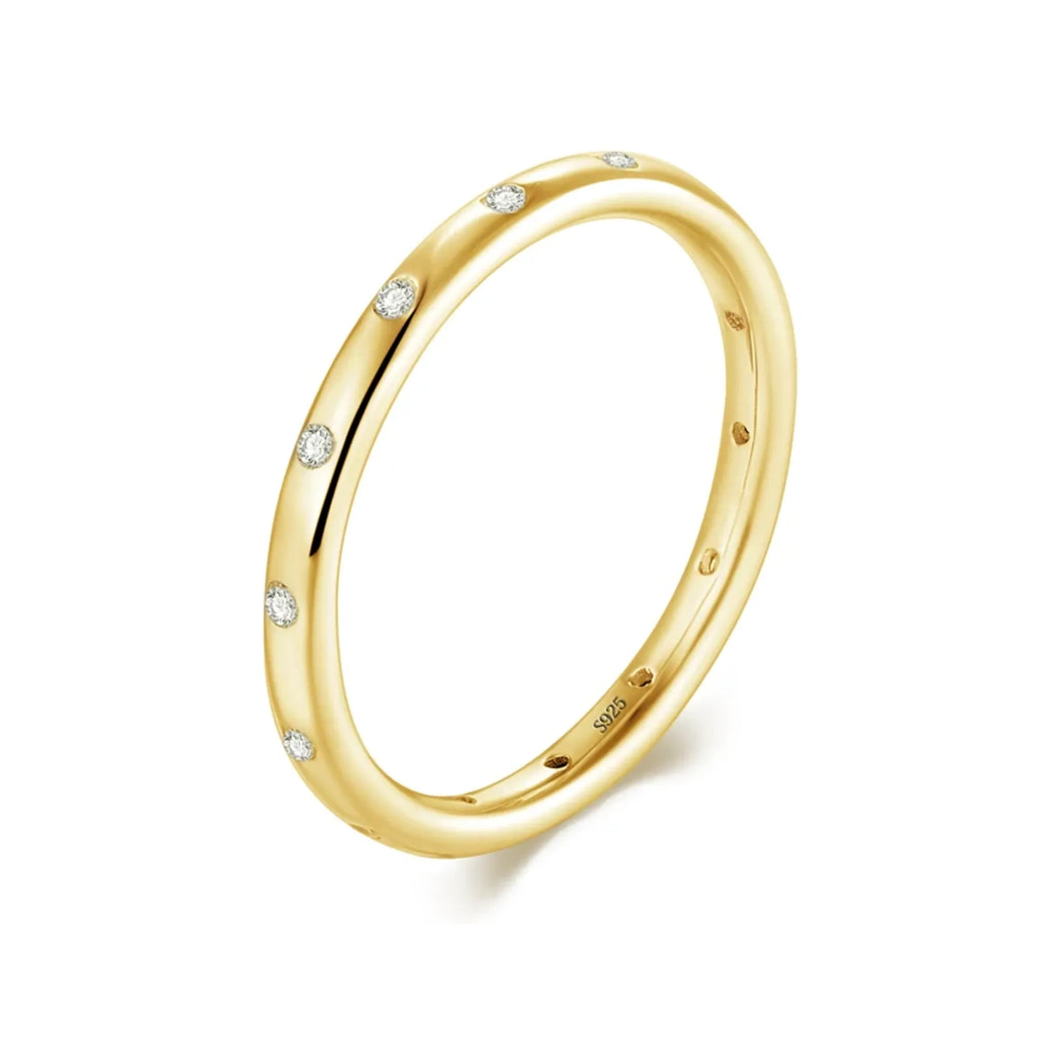 Slim scattered-stone band ring in gold-tone on white background