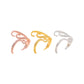 Three tentacle wrap rings in rose gold-tone, gold-tone, and silver-tone displayed in a white ring tray