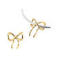 Gold-tone bow charm shown worn on a bracelet and displayed as a loose charm