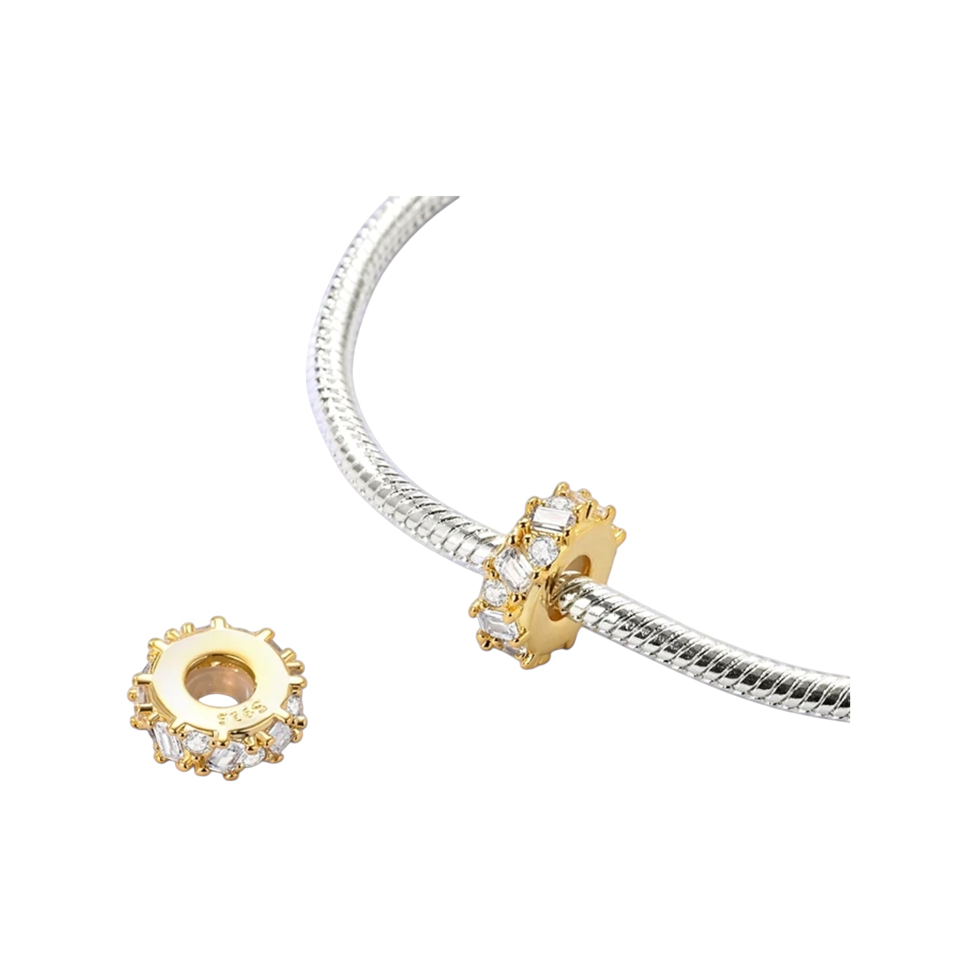gold-tone round spacer with raised prong-set clear stones around the edge