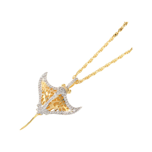 Gold-tone rope chain with two-tone manta ray pendant featuring clear pavé stones and openwork body
