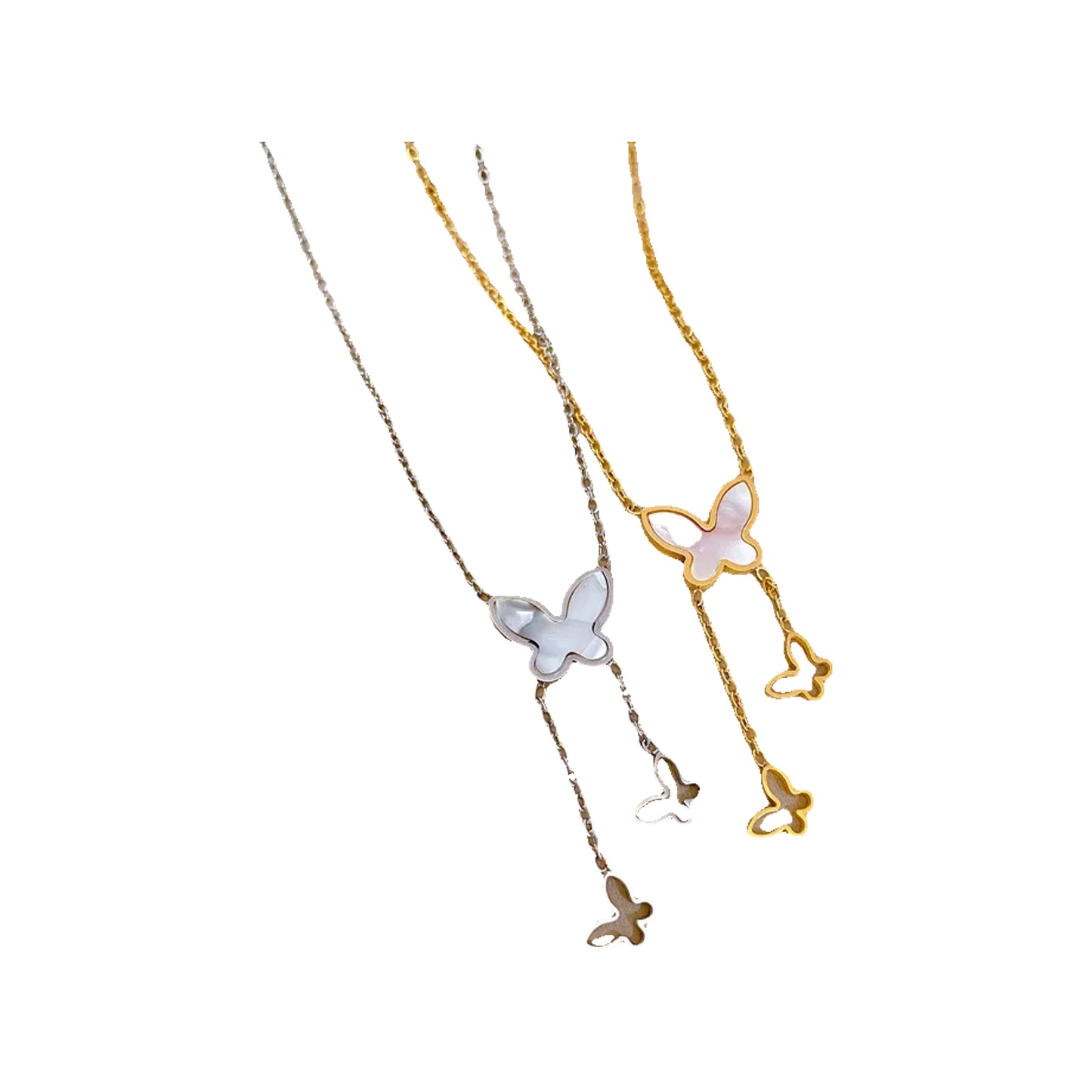 e7b201d8-069e-49ba-9201-3268e72d09d3 silver-tone and gold-tone butterfly lariat necklaces with dangling charms on display
