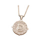 Silver-tone round spiral medallion pendant with textured center and crystal halo