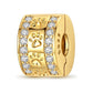 gold-tone paw-print bead charm with two clear-stone rows