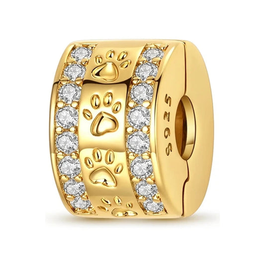gold-tone paw-print bead charm with two clear-stone rows