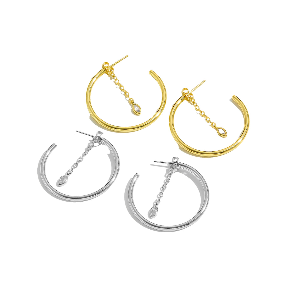 Two gold-tone and two silver-tone 25 mm hoops with marquise chain dangles arranged diagonally
