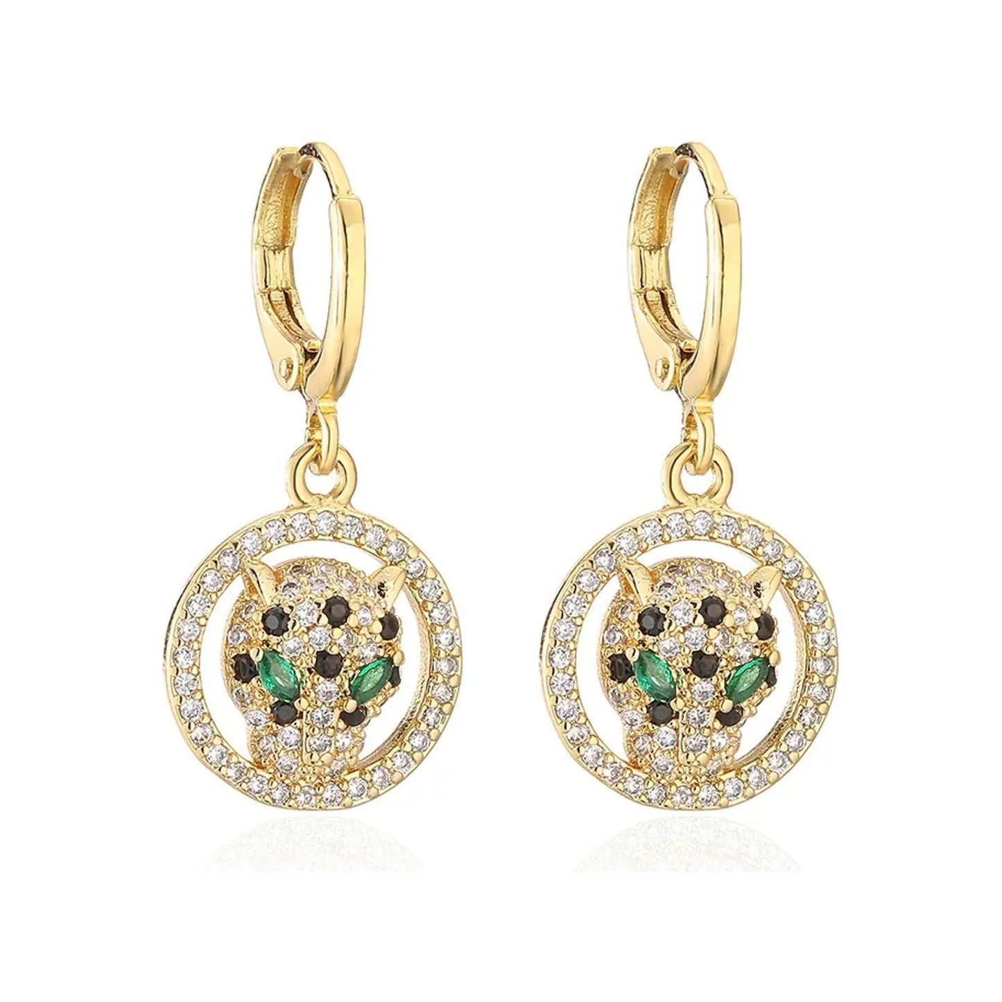 Gold-tone leopard head drop earrings set inside crystal-studded round frames on white background