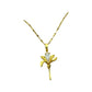 gold-tone floral pendant necklace with elongated petals and central clear stone