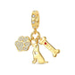 gold-tone dog trio charm with pavé paw, dog silhouette and bone tag