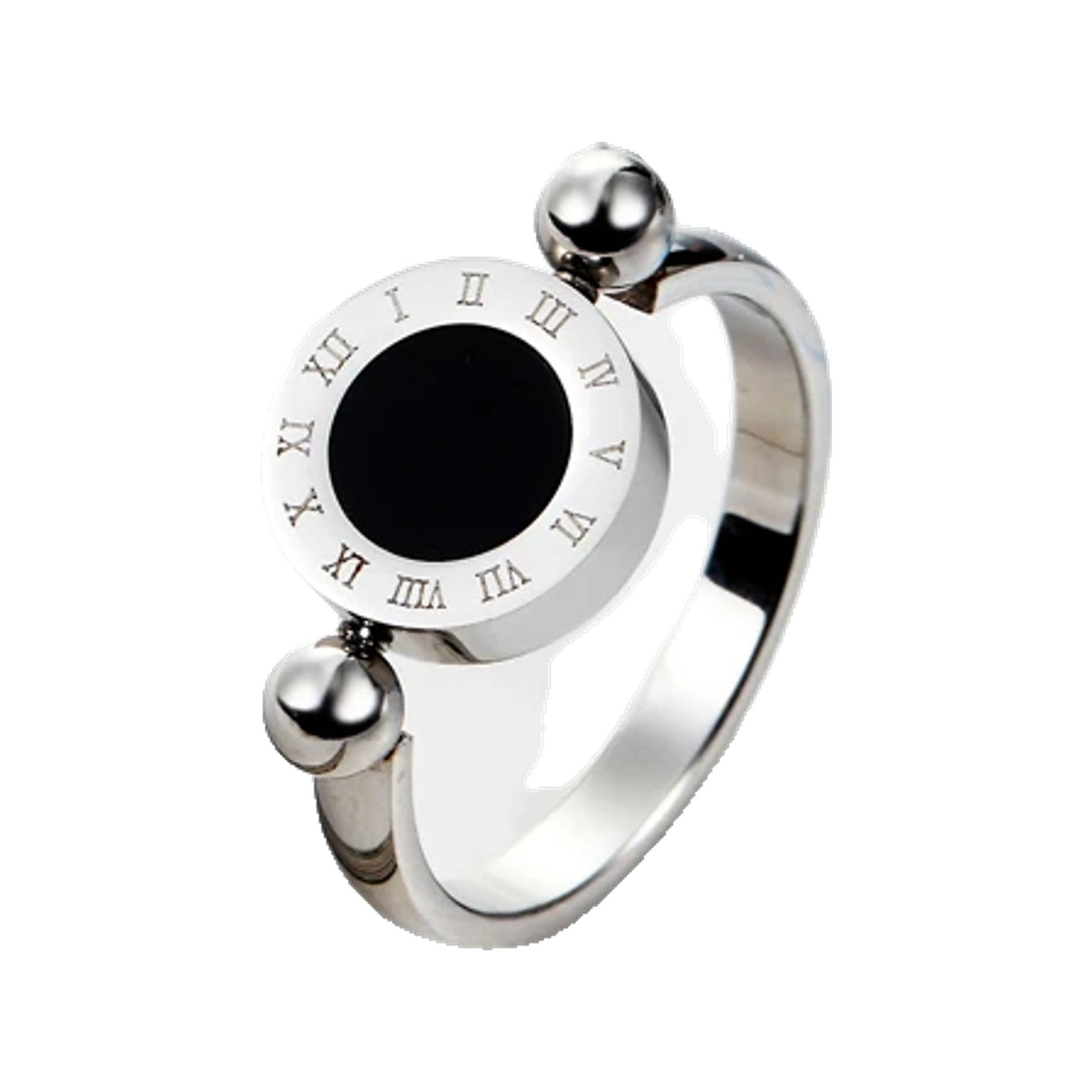 Silver-tone Roman numeral spinner ring with black enamel placed on an open magazine