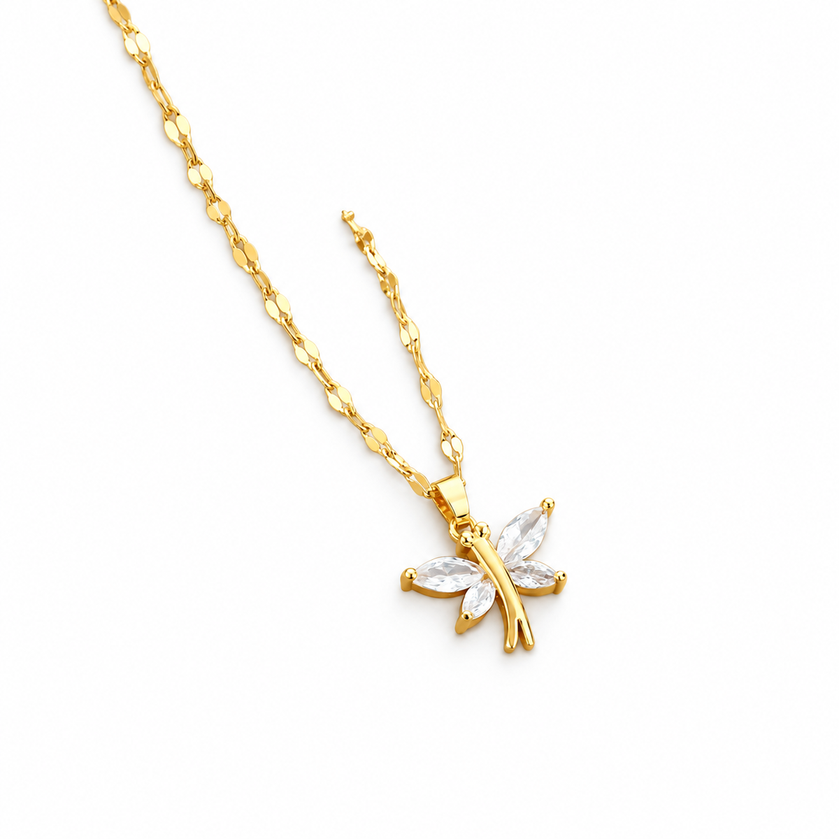 Gold-tone dragonfly pendant necklace on white background